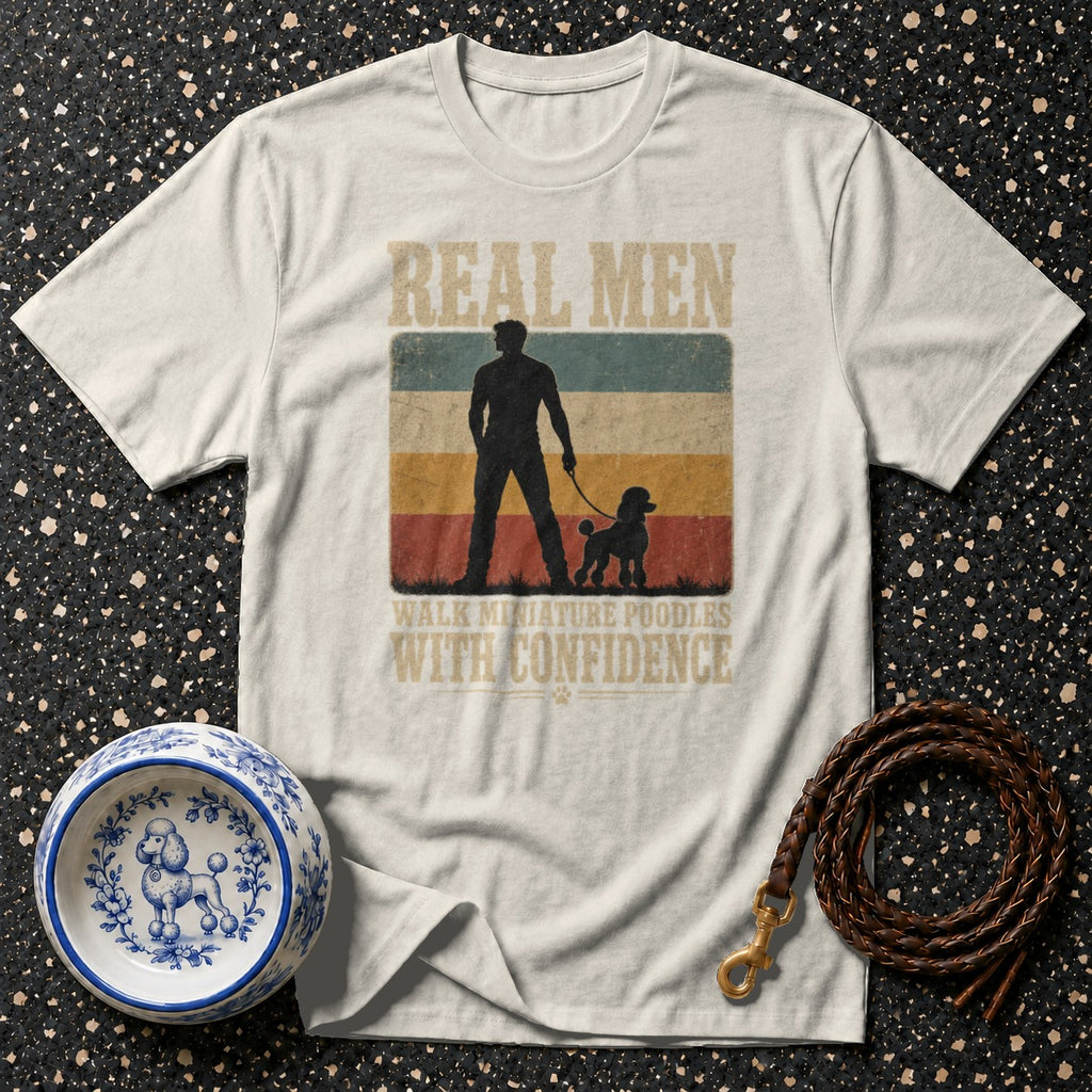 T-shirt with vintage graphic: man silhouette walking poodle, text "REAL MEN WALK MINIATURE POODLES WITH CONFIDENCE."