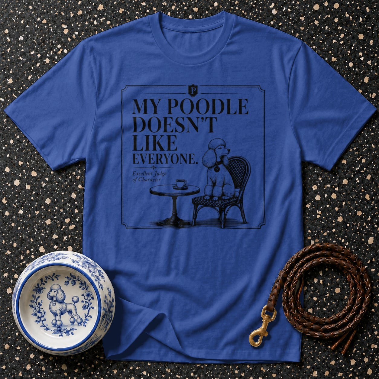 Blue t-shirt with "MY POODLE DOESN'T LIKE EVERYONE. Excellent Judge of Character" text and illustration.