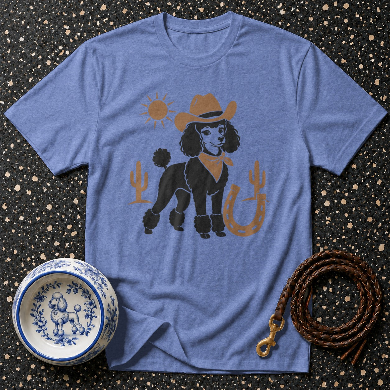 Blue t-shirt with a poodle wearing a cowboy hat and bandana, with desert graphics.