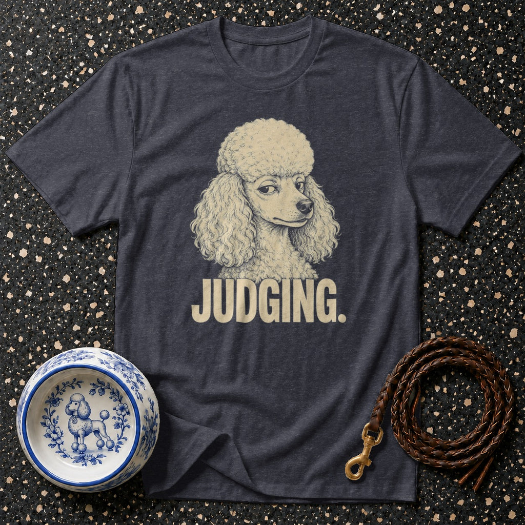Dark t-shirt with a poodle illustration and the text "JUDGING."