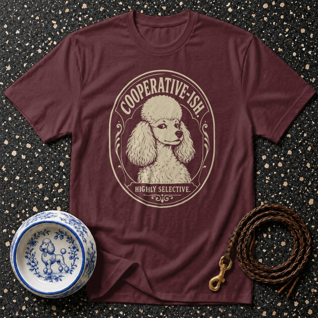 Maroon t-shirt with poodle graphic and "Cooperative-ish. Highly Selective." text.