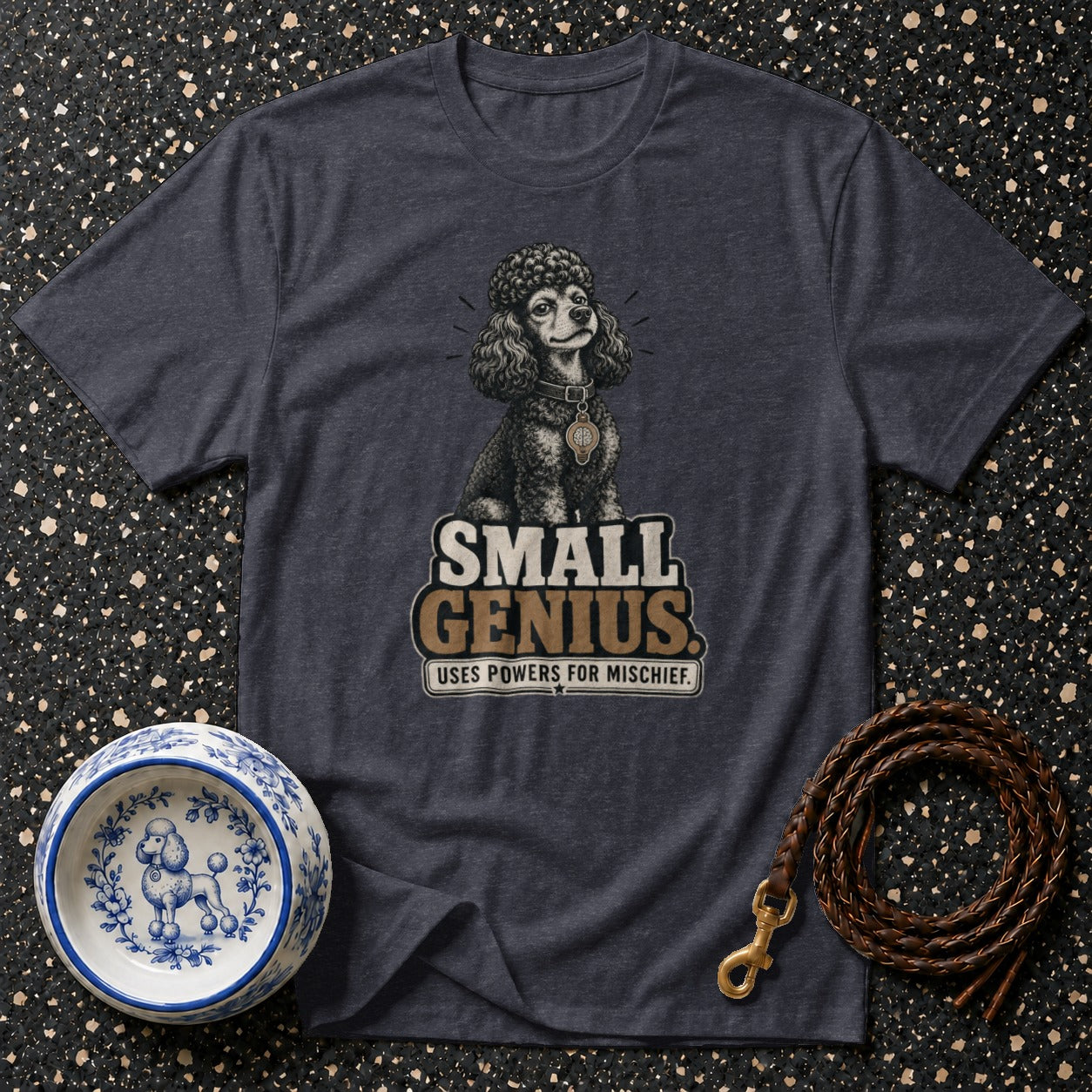 Dark grey t-shirt with a poodle graphic and text "SMALL GENIUS USES POWERS FOR MISCHIEF".