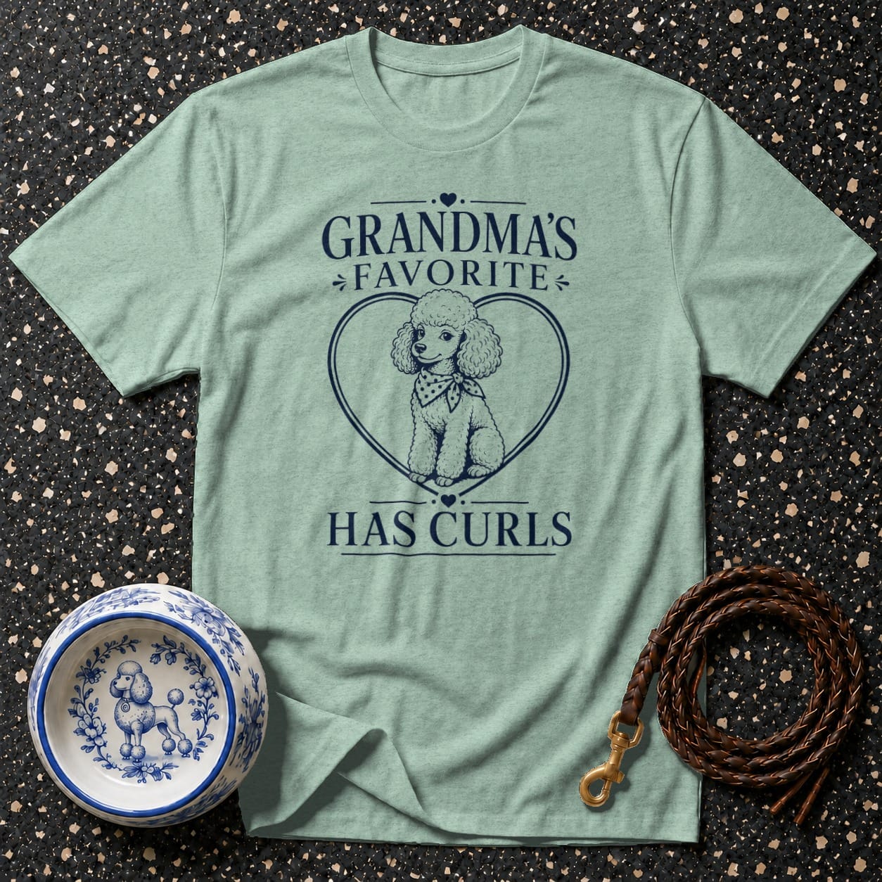 Light green t-shirt with "Grandma's Favorite Has Curls" and a poodle in a heart.