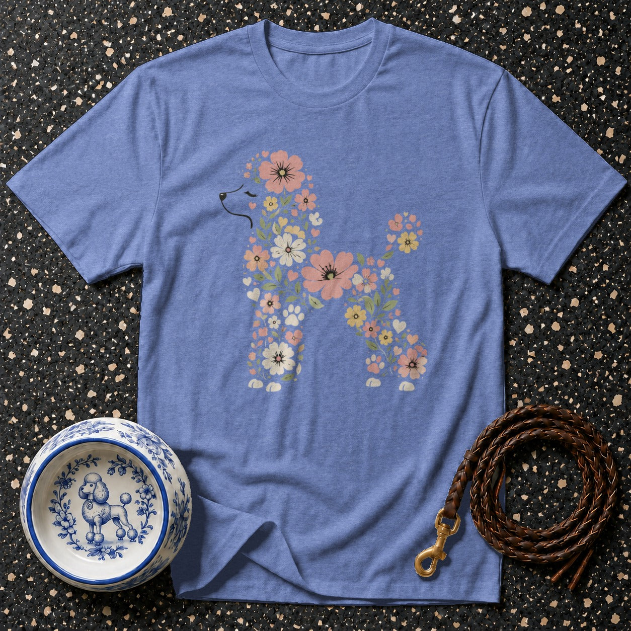 Periwinkle t-shirt with poodle graphic made of flowers and hearts.