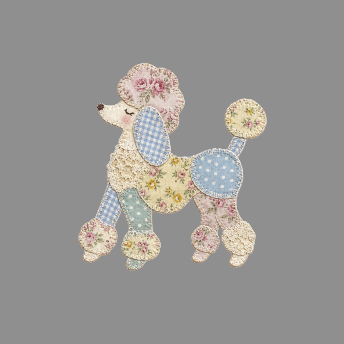 Quilted poodle applique with floral, gingham, and polka dot fabrics.