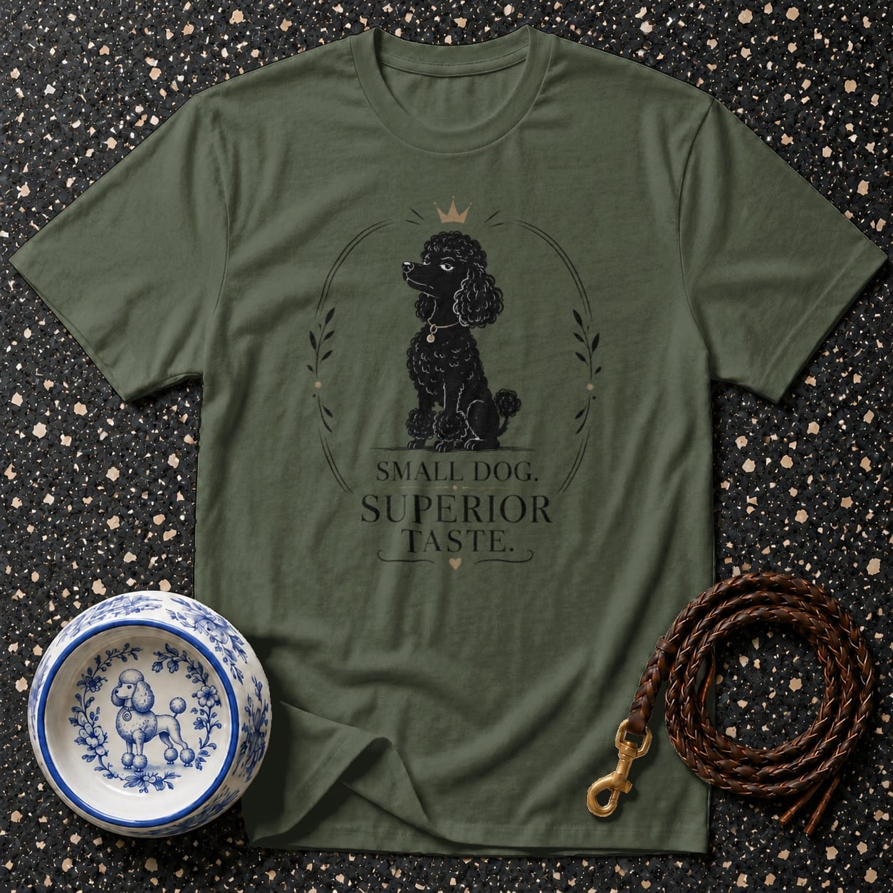 Olive green t-shirt with black poodle graphic and text "SMALL DOG. SUPERIOR TASTE."