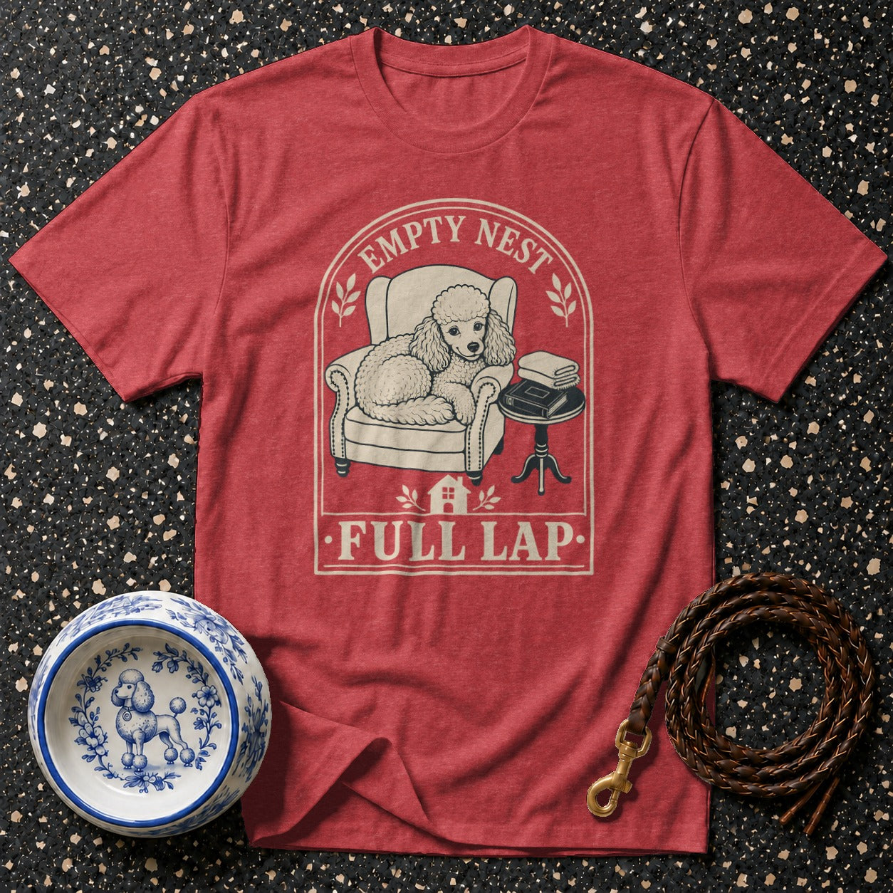 Red t-shirt with poodle in chair graphic, "Empty Nest Full Lap" text.