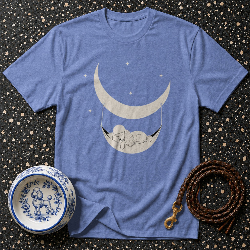 Blue t-shirt with a poodle sleeping in a hammock on a moon graphic.