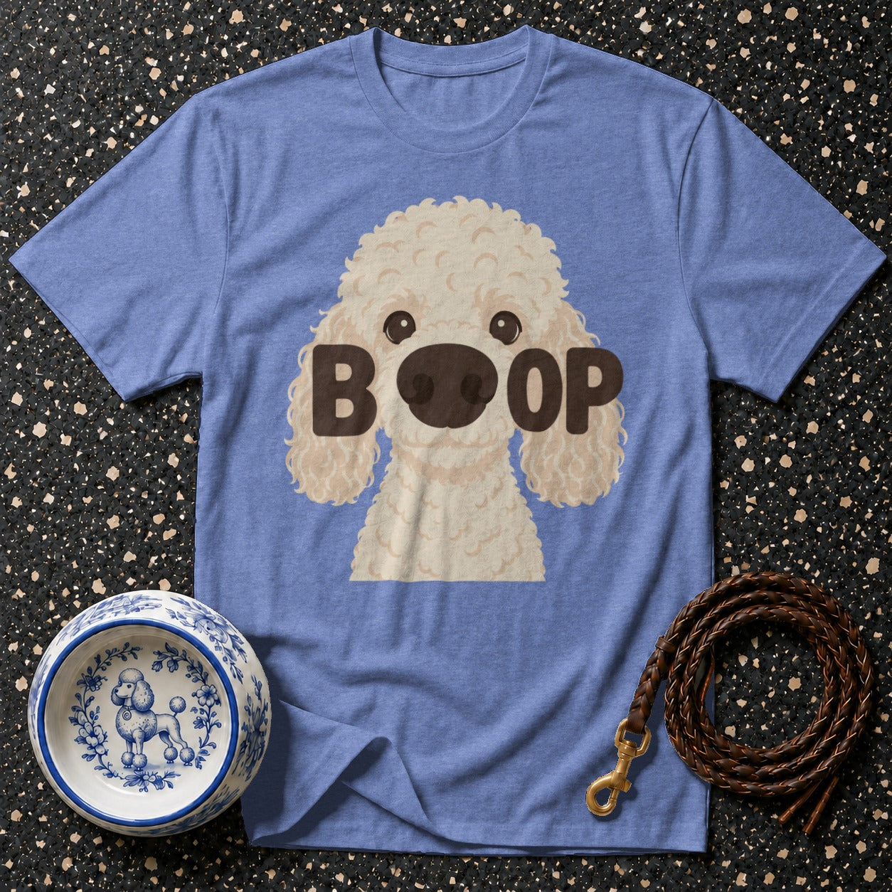 Blue t-shirt with cartoon poodle graphic and "BOOP" text.