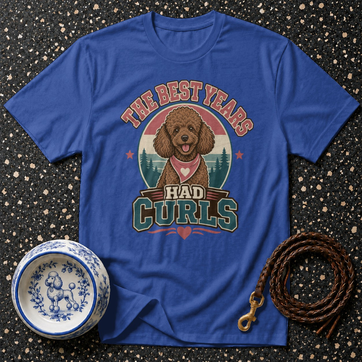 Blue t-shirt with vintage poodle graphic and text: "THE BEST YEARS HAD CURLS".