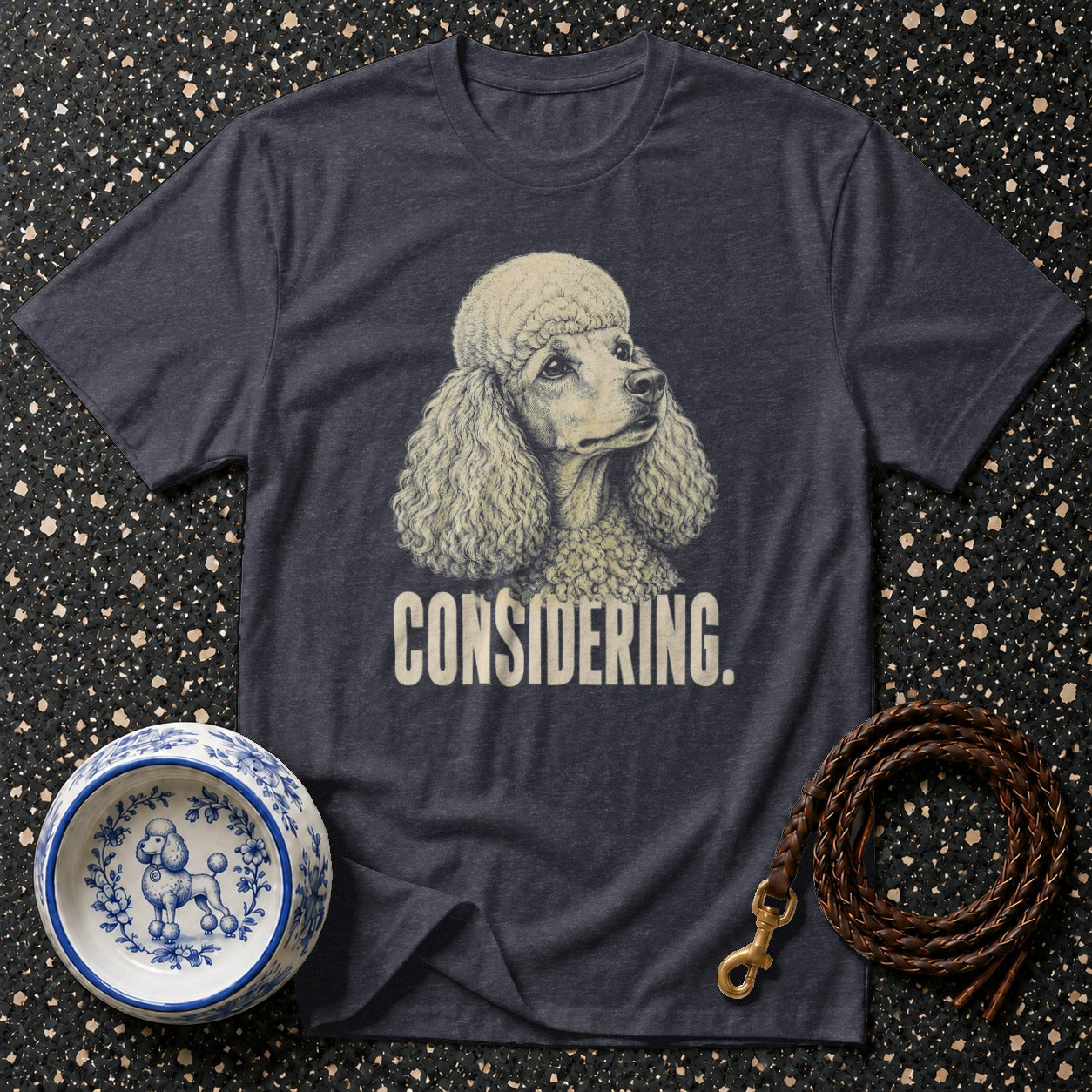 Dark grey t-shirt with a poodle graphic and the word "CONSIDERING."