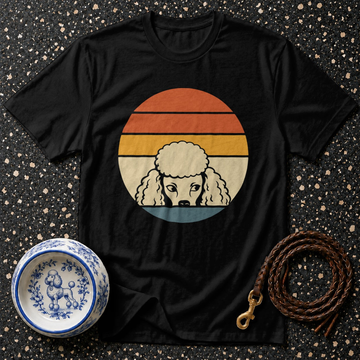 Black t-shirt with vintage poodle graphic inside a sunset circle.