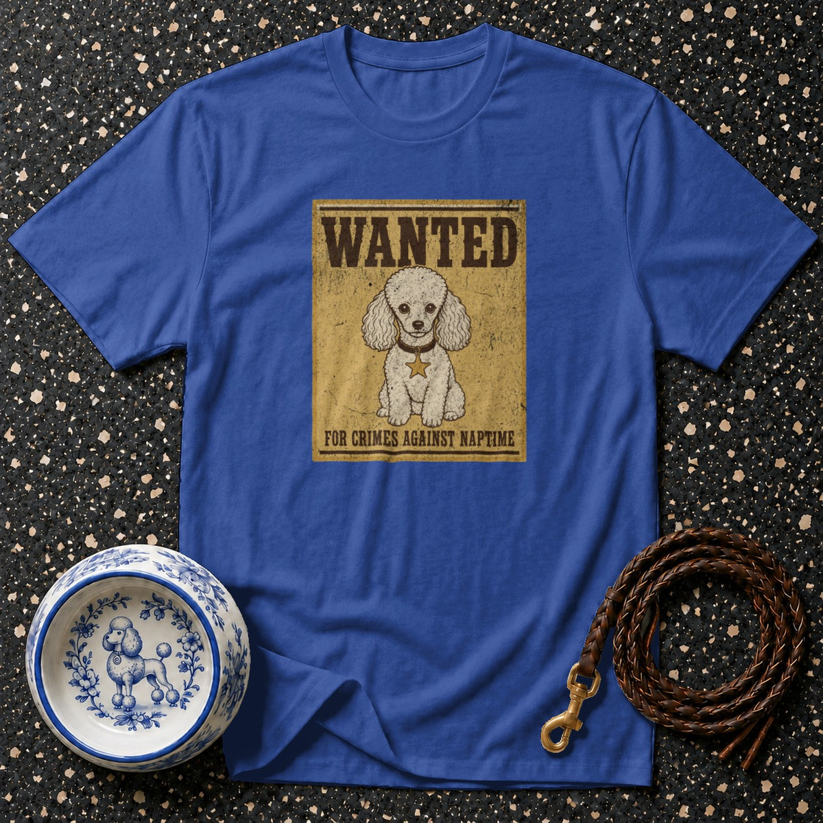 Blue t-shirt with "Wanted" poster of a poodle for crimes against naptime.