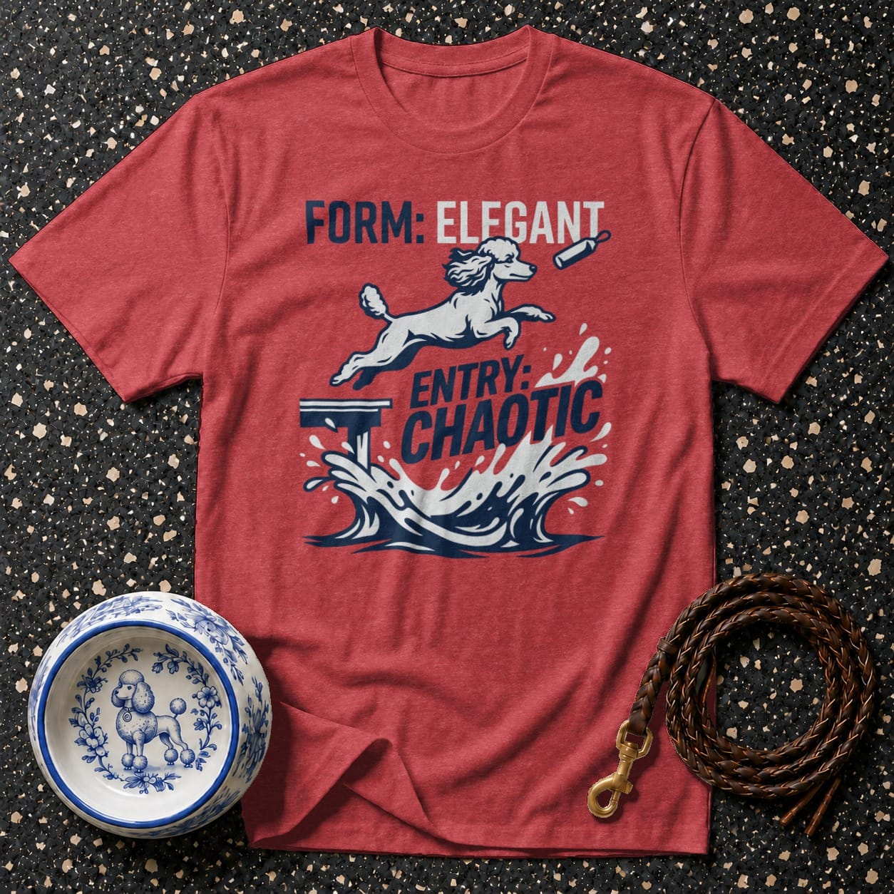 Red t-shirt graphic of poodle jumping into water, text "FORM: ELEGANT ENTRY: CHAOTIC".