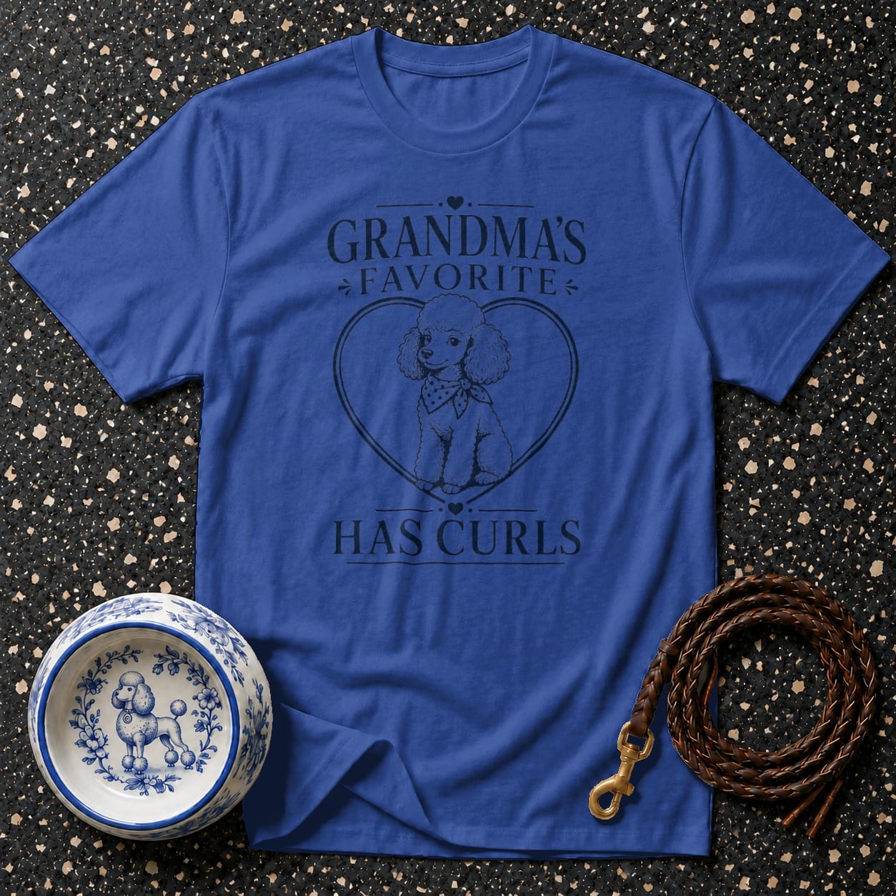 Blue t-shirt with "Grandma's Favorite Has Curls" text and poodle graphic.