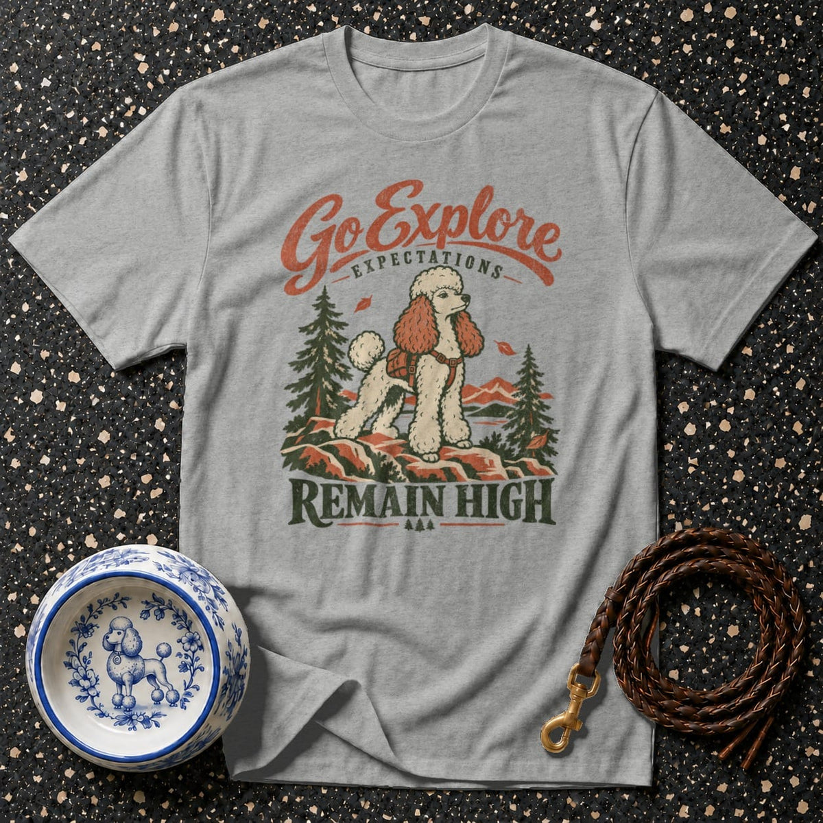 Grey t-shirt with "Go Explore" and poodle on mountain, with "Remain High" text.