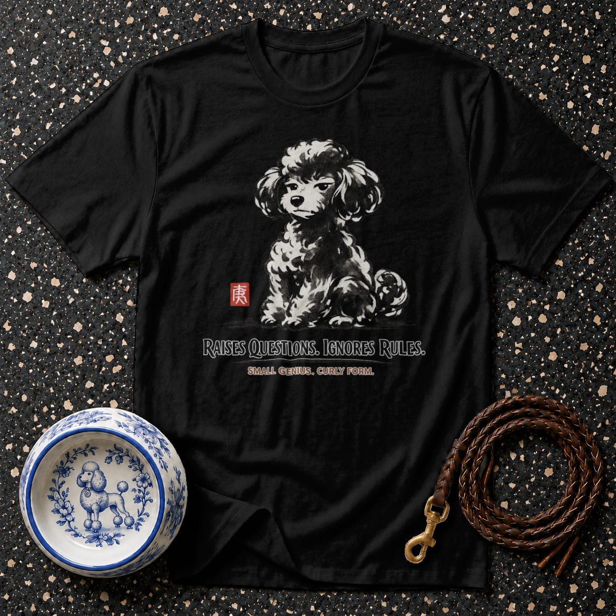Black t-shirt with a poodle illustration and text "Raises Questions. Ignores Rules."