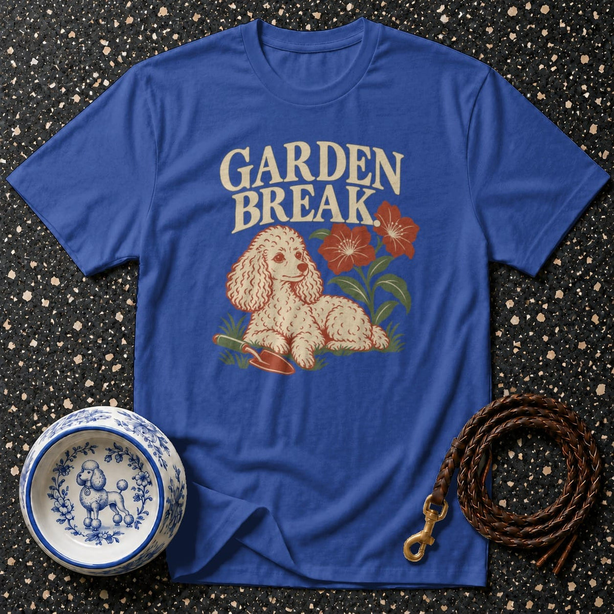 Blue t-shirt with "GARDEN BREAK" text and a poodle in a garden.