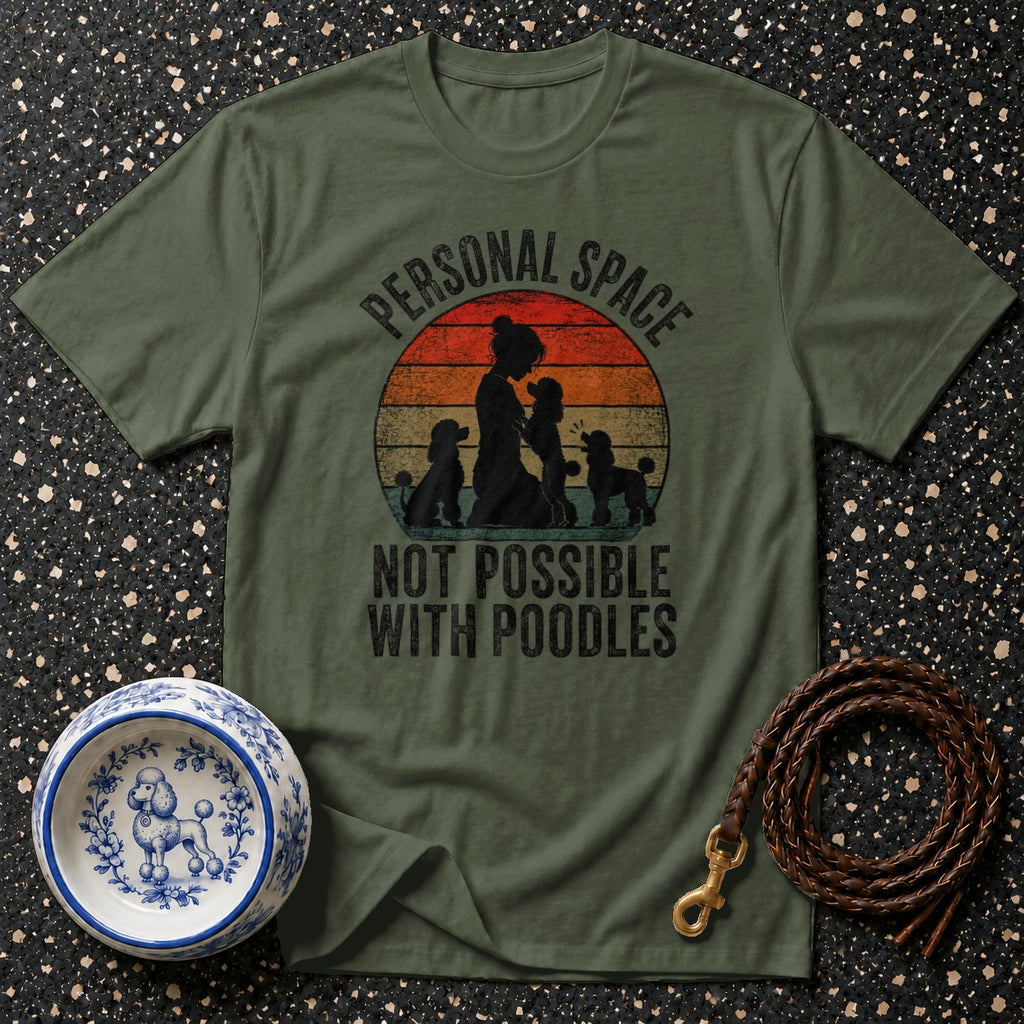 Green t-shirt with "Personal Space Not Possible With Poodles" slogan featuring poodles and a sunset graphic.