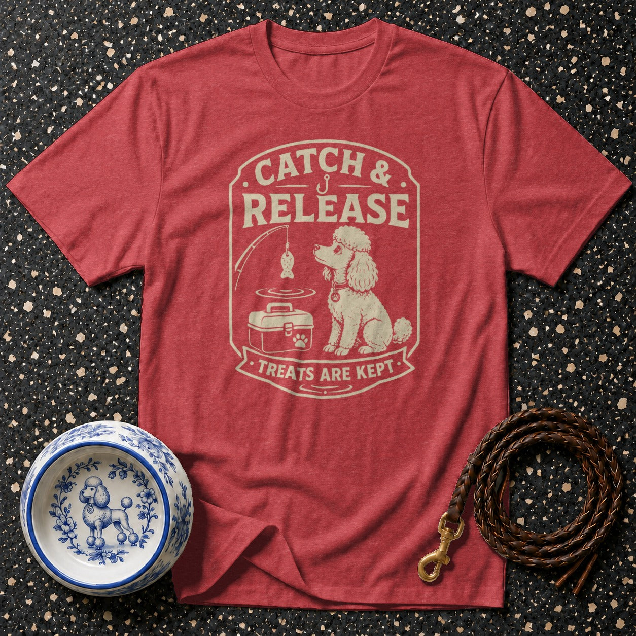 Red t-shirt with "Catch & Release Treats are Kept" graphic and poodle.