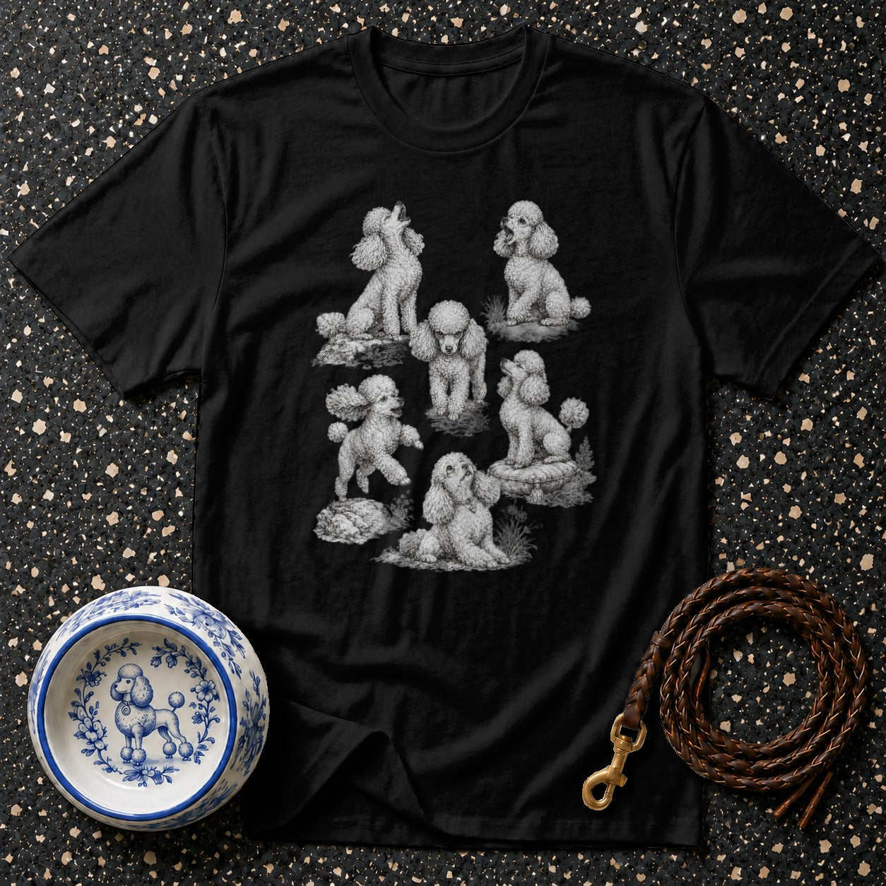 Black t-shirt with seven sketched poodles in various poses.