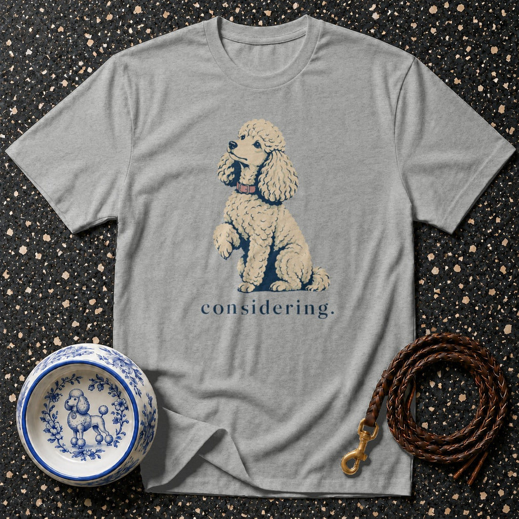 Gray t-shirt with a poodle illustration and the word "considering" below.