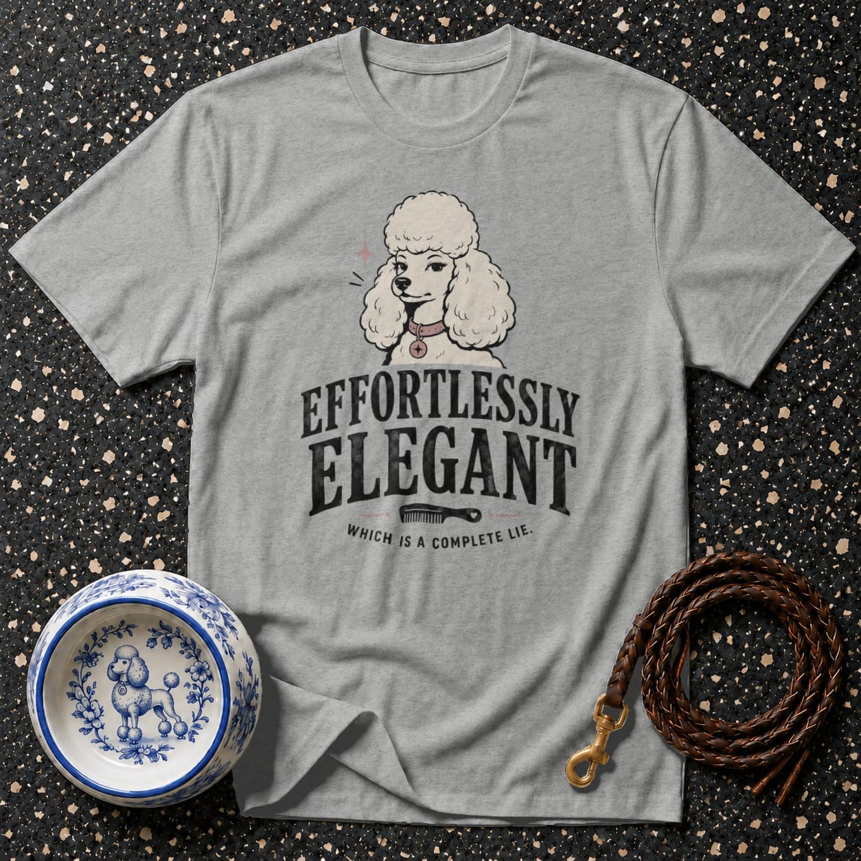 Grey t-shirt with poodle graphic and text "Effortlessly Elegant Which is a Complete Lie."