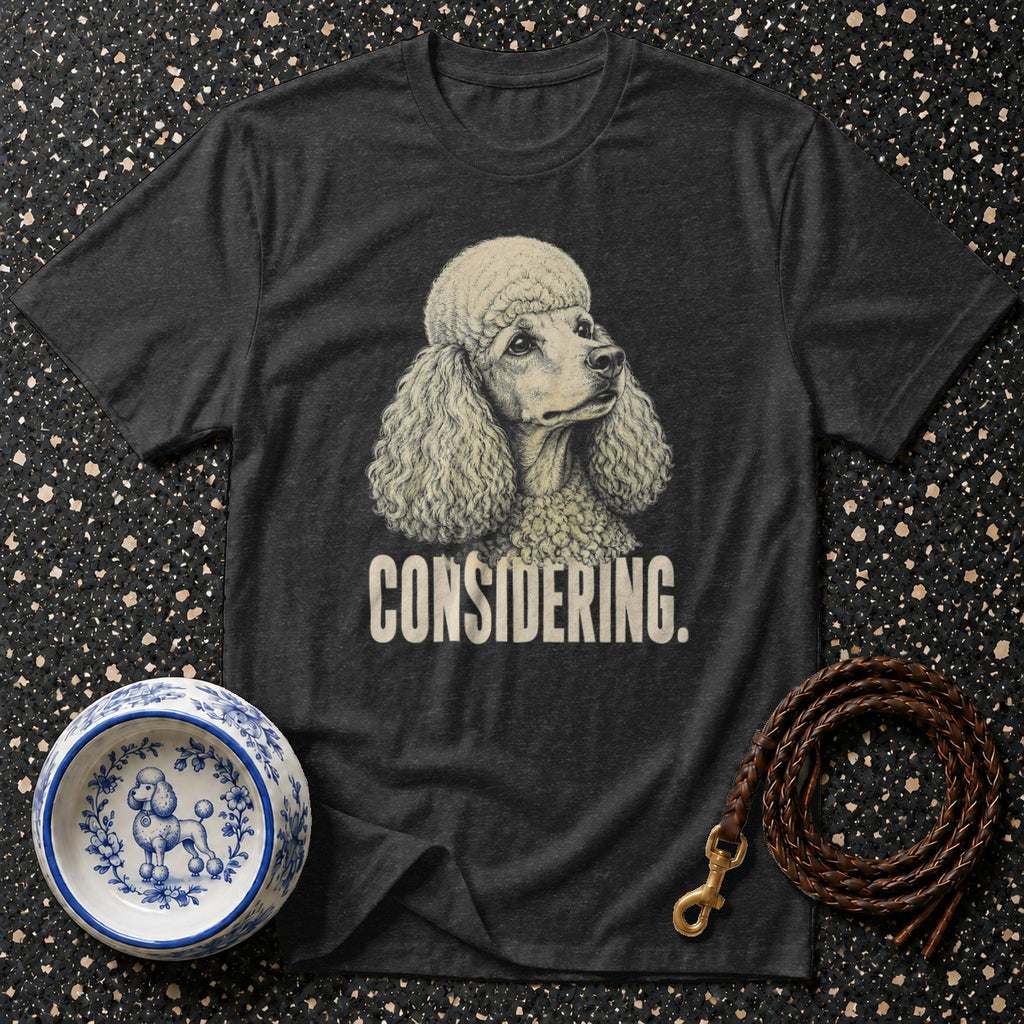 Dark grey t-shirt with poodle illustration and "CONSIDERING." text.