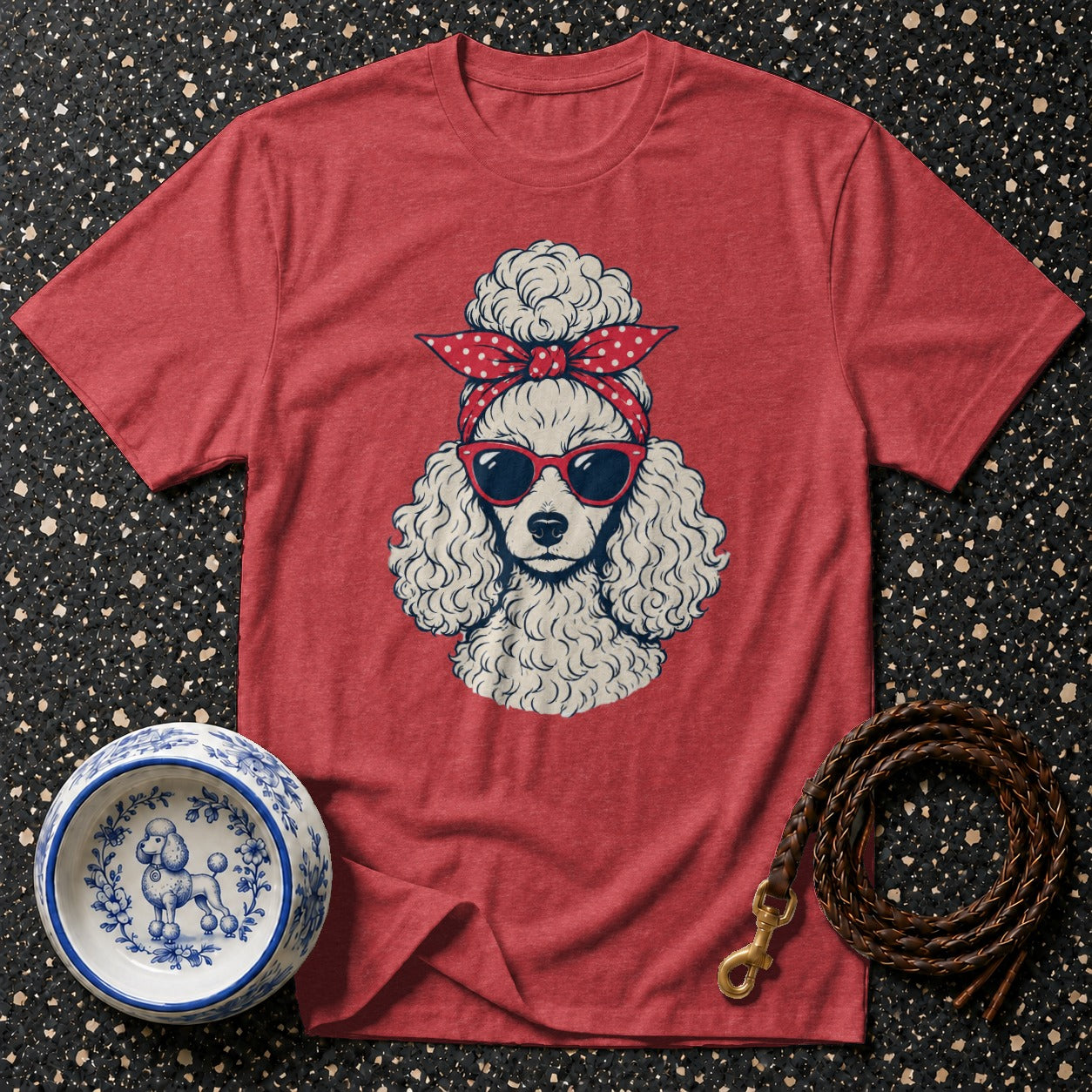 Red t-shirt with a white poodle illustration wearing a polka dot bandana and sunglasses.