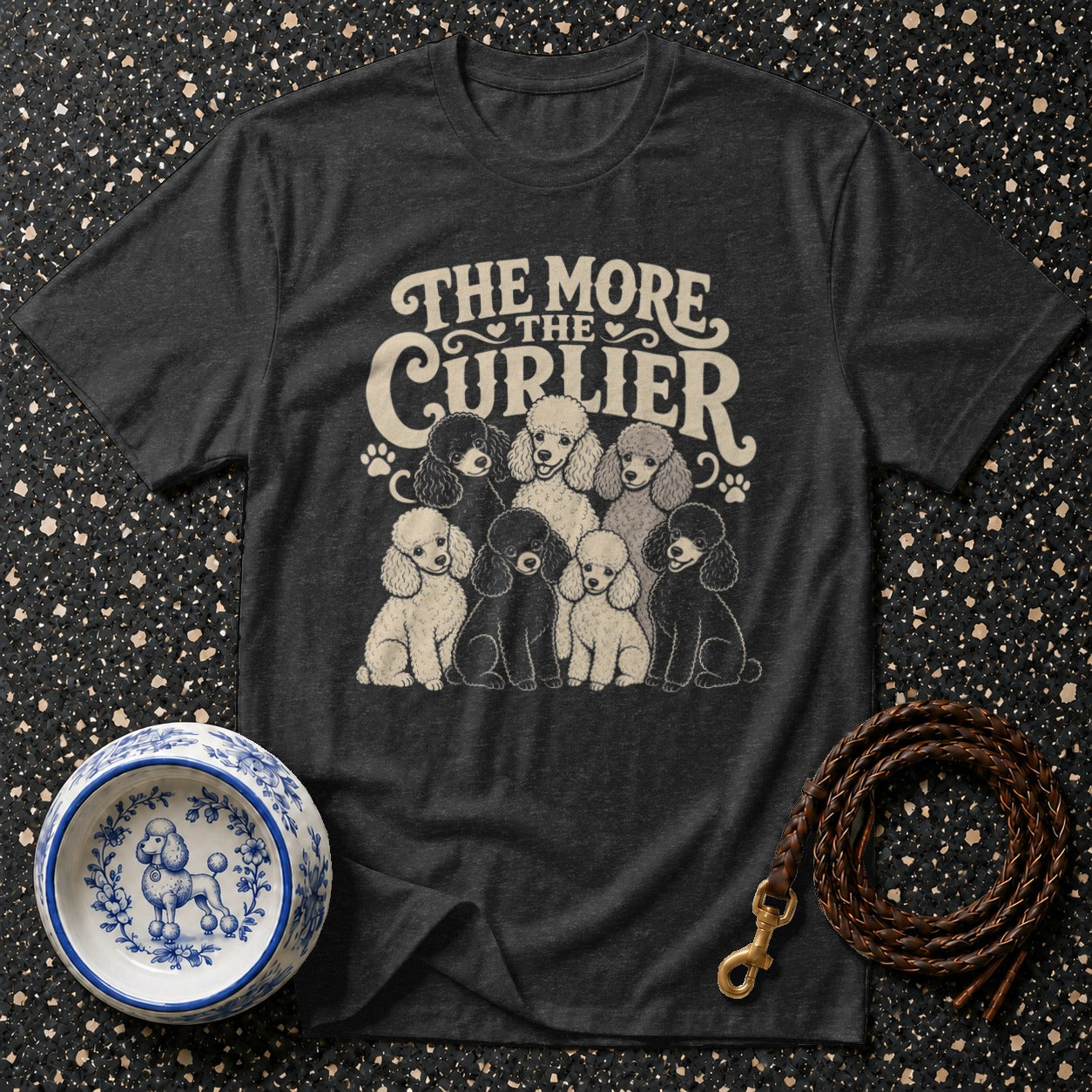 Dark gray t-shirt with "The More The Curlier" and cartoon poodles.