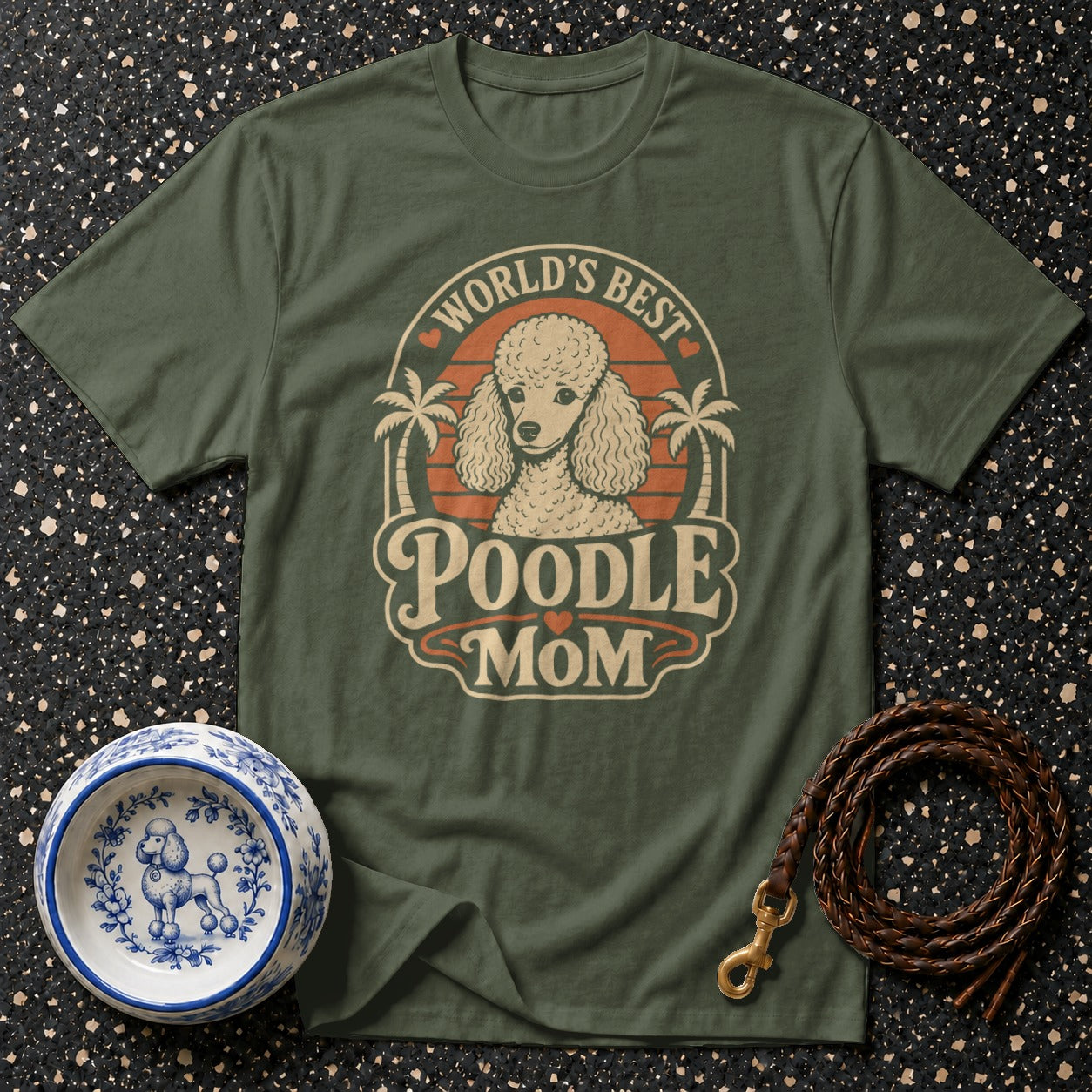 Green t-shirt with "World's Best Poodle Mom" text and poodle graphic.