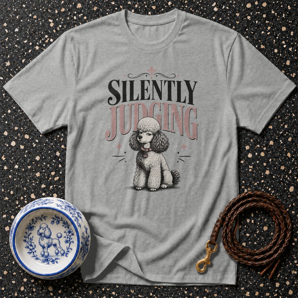 Grey t-shirt with poodle graphic and text "Silently Judging".
