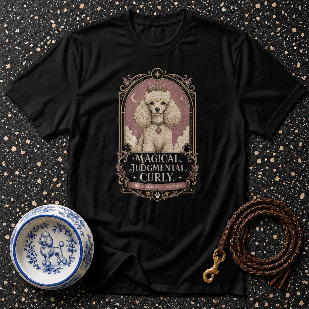 Black t-shirt with a poodle illustration reading "Magical. Judgmental. Curly."