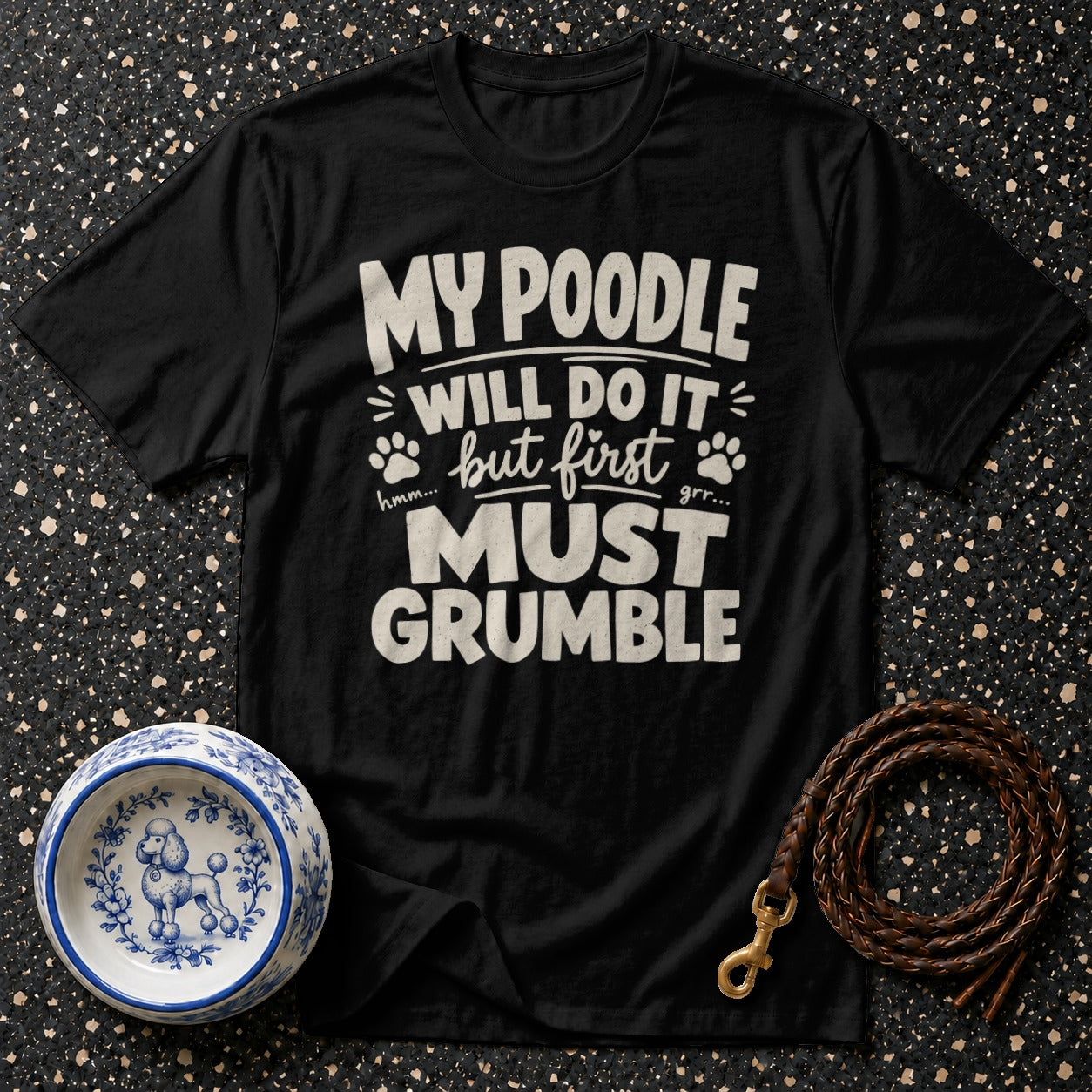 Black t-shirt with "My poodle will do it but first must grumble" text.