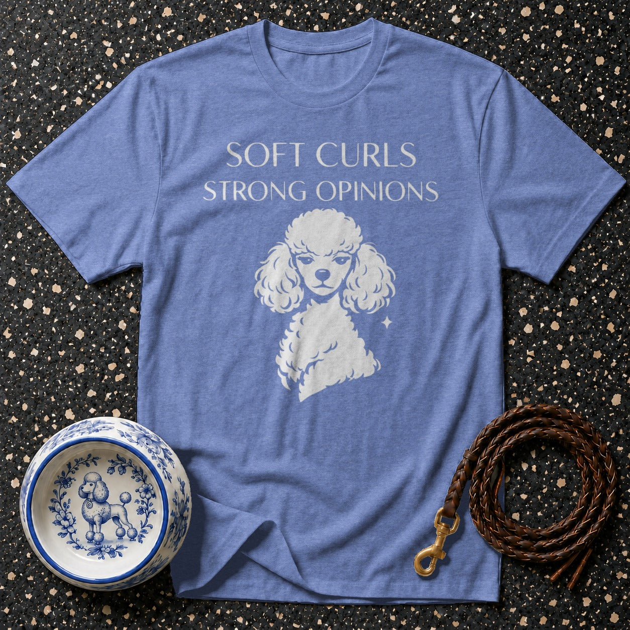 Blue t-shirt with "SOFT CURLS STRONG OPINIONS" and poodle graphic.