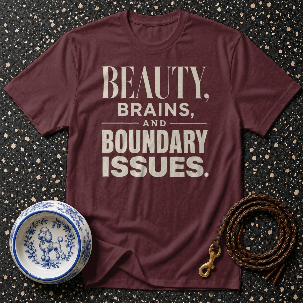 Maroon t-shirt with text "BEAUTY, BRAINS, AND BOUNDARY ISSUES."