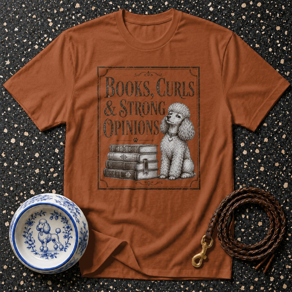 Brown t-shirt with "Books, Curls & Strong Opinions" text and poodle graphic.