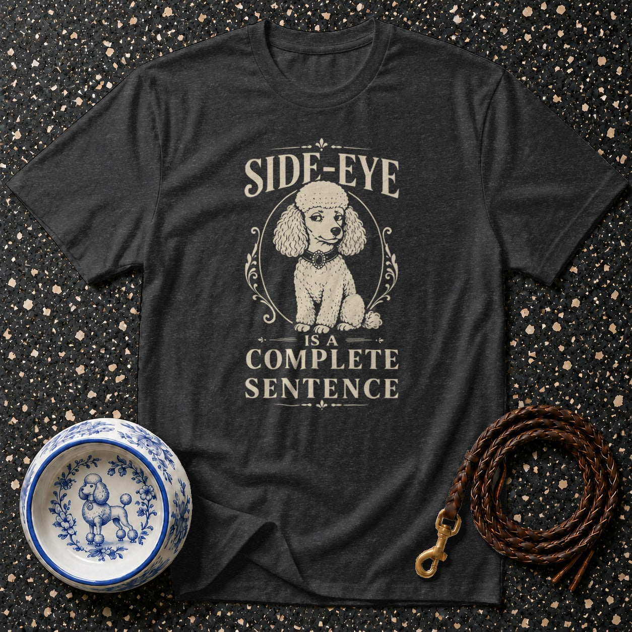 Dark grey t-shirt with a poodle graphic and the text "SIDE-EYE IS A COMPLETE SENTENCE."