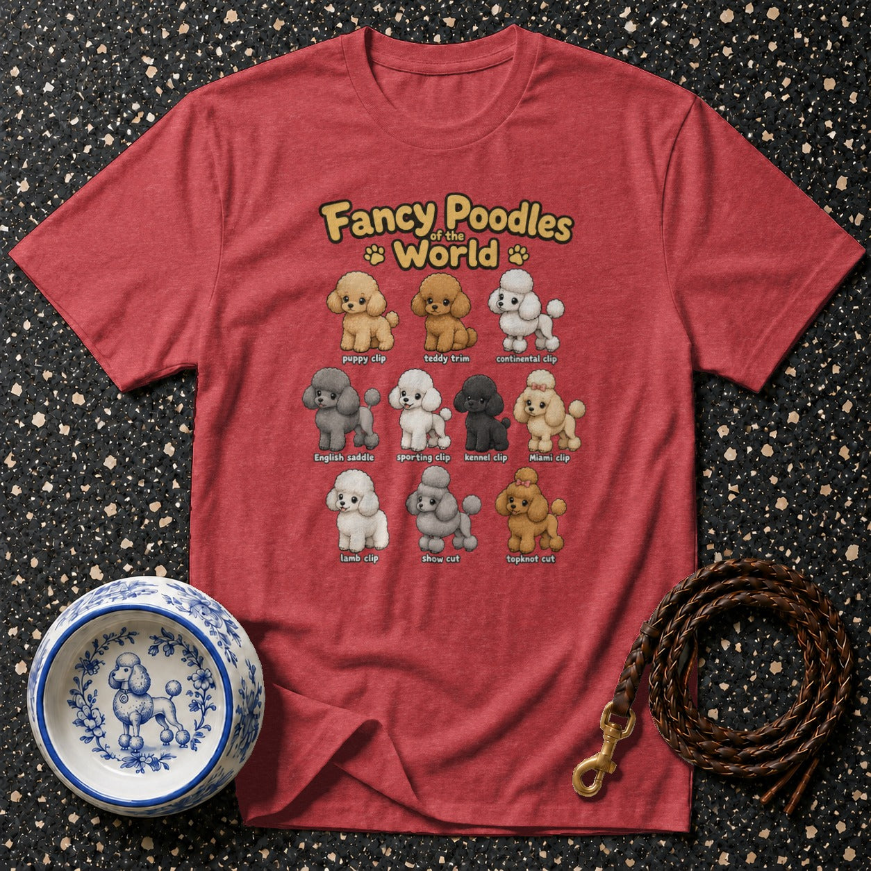 Red t-shirt with "Fancy Poodles of the World" and illustrations of poodles in various haircuts.