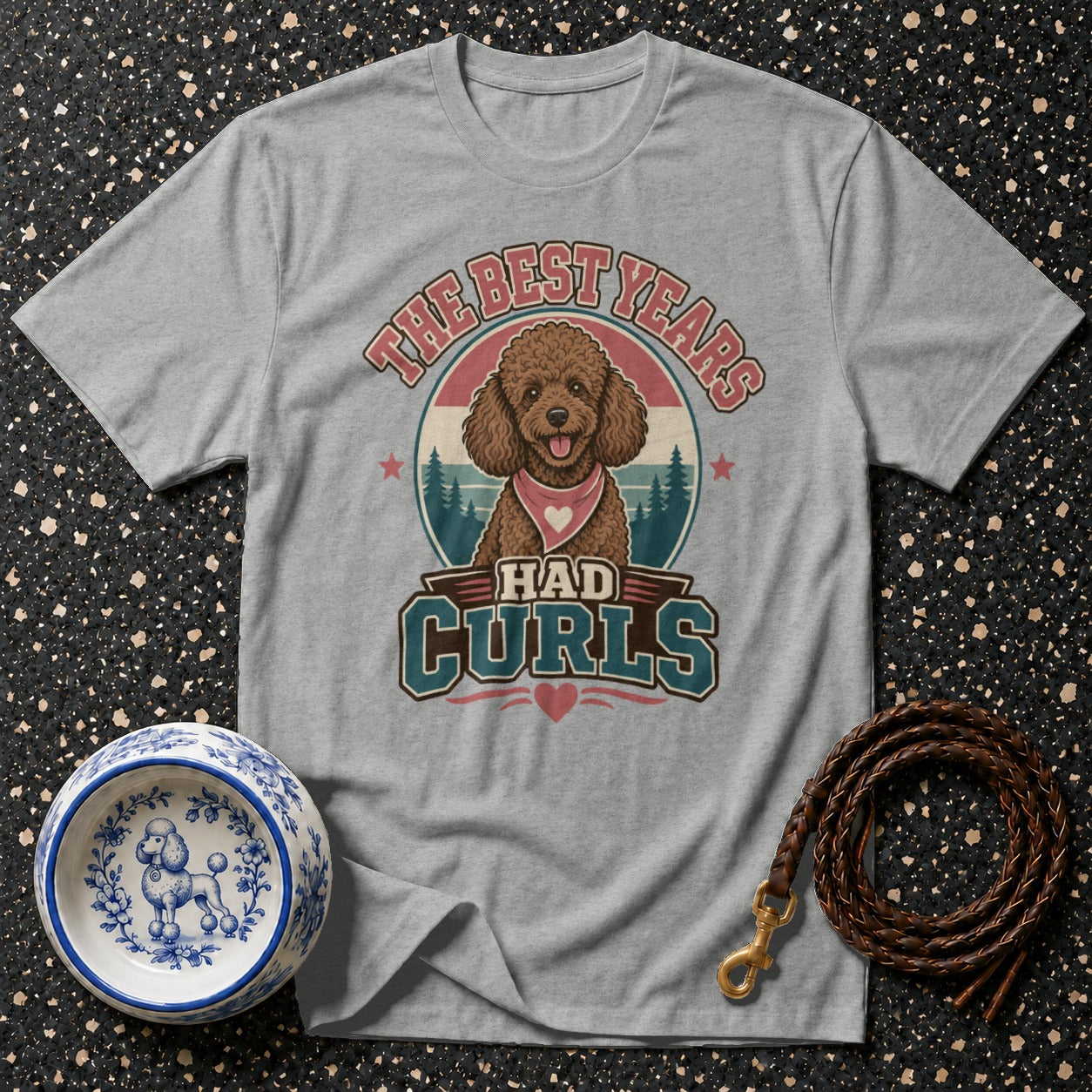 Gray t-shirt with a cartoon brown poodle and text "The Best Years Had Curls".