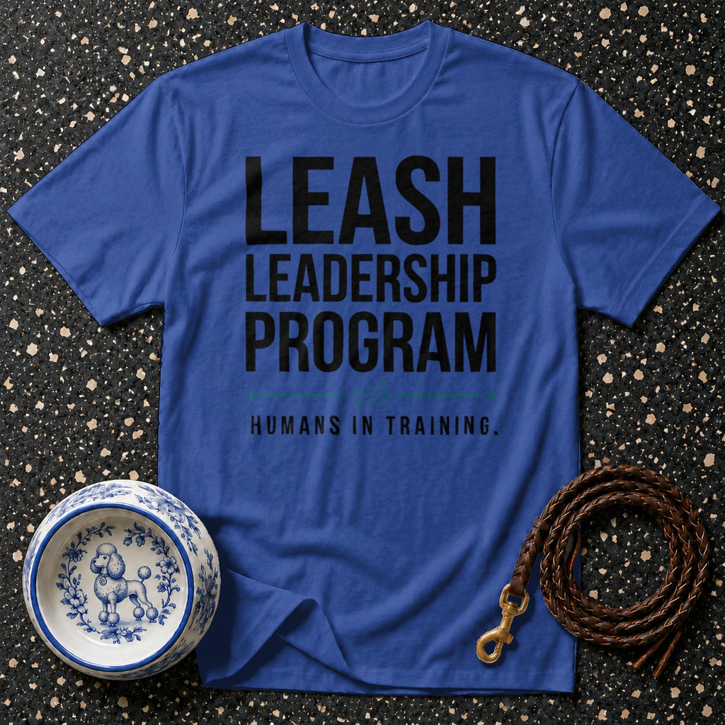 Royal blue t-shirt with "LEASH LEADERSHIP PROGRAM HUMANS IN TRAINING" text.