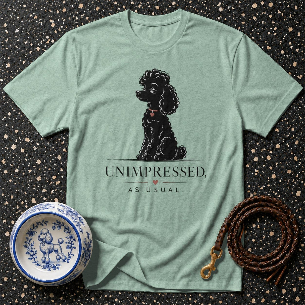 Mint t-shirt with black poodle graphic and text "UNIMPRESSED, AS USUAL."