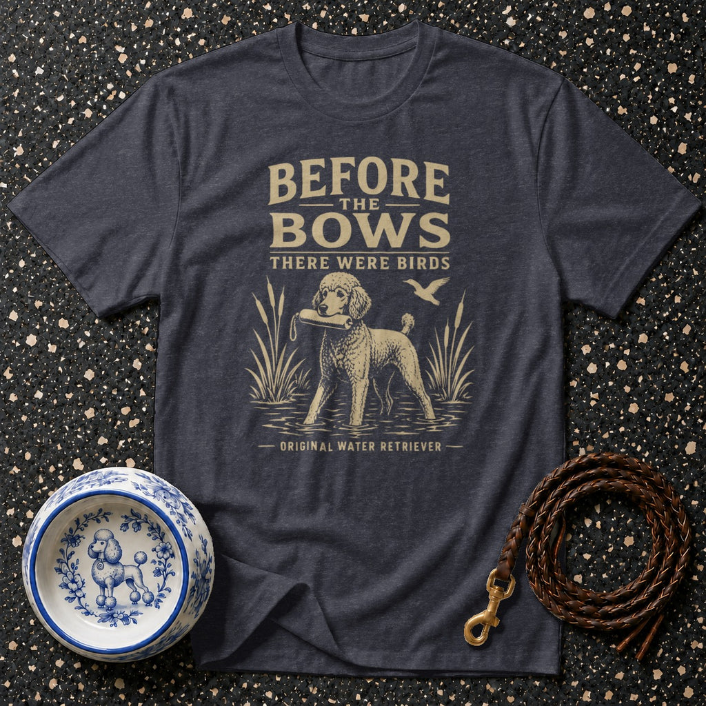 Dark t-shirt with poodle retrieving a duck, reads "Before the bows there were birds original water retriever".