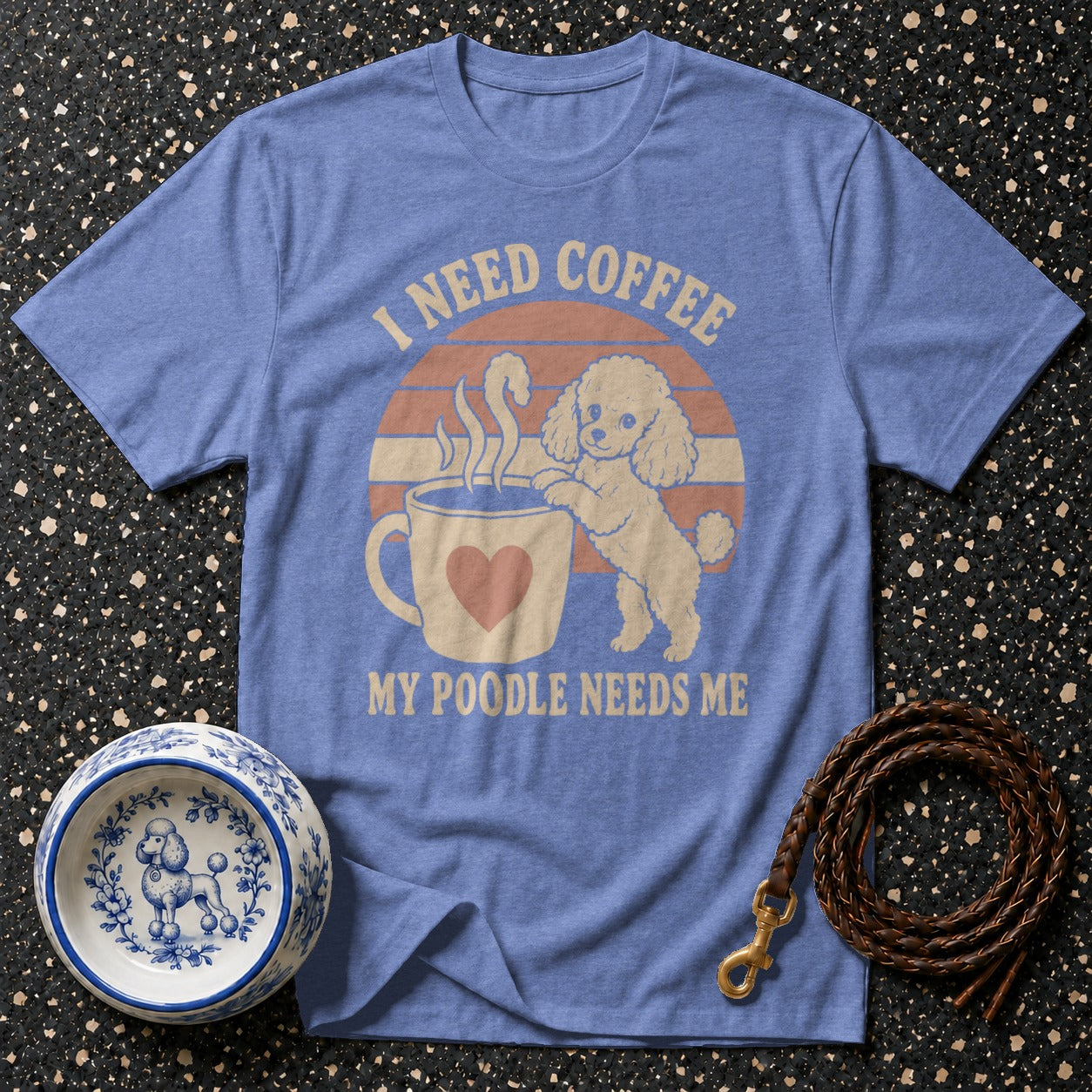 Blue t-shirt with poodle and coffee cup graphic, reads "I NEED COFFEE MY POODLE NEEDS ME".