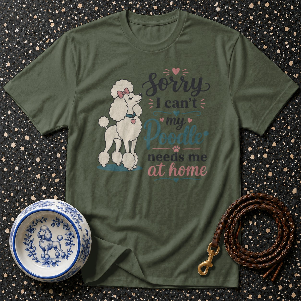 Olive green t-shirt with white poodle graphic and text saying "Sorry I can't my Poodle needs me at home".