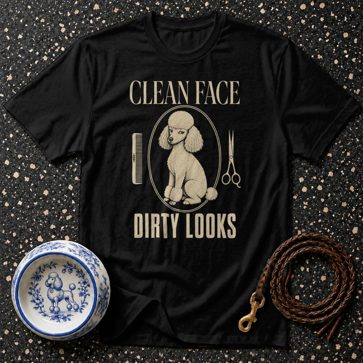 Black t-shirt with a poodle graphic, comb, scissors, and text "CLEAN FACE DIRTY LOOKS".