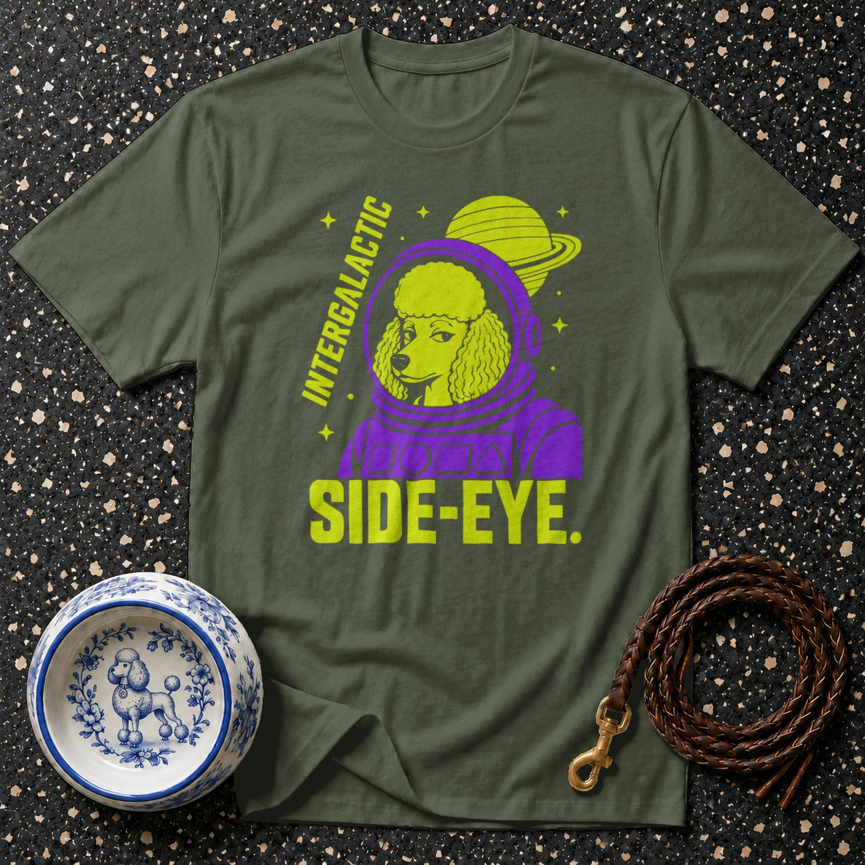 Green t-shirt with a poodle in a purple astronaut helmet and "SIDE-EYE." text.