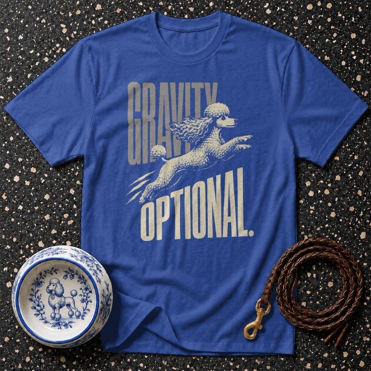 Blue t-shirt with "Gravity Optional" text and a poodle illustration.