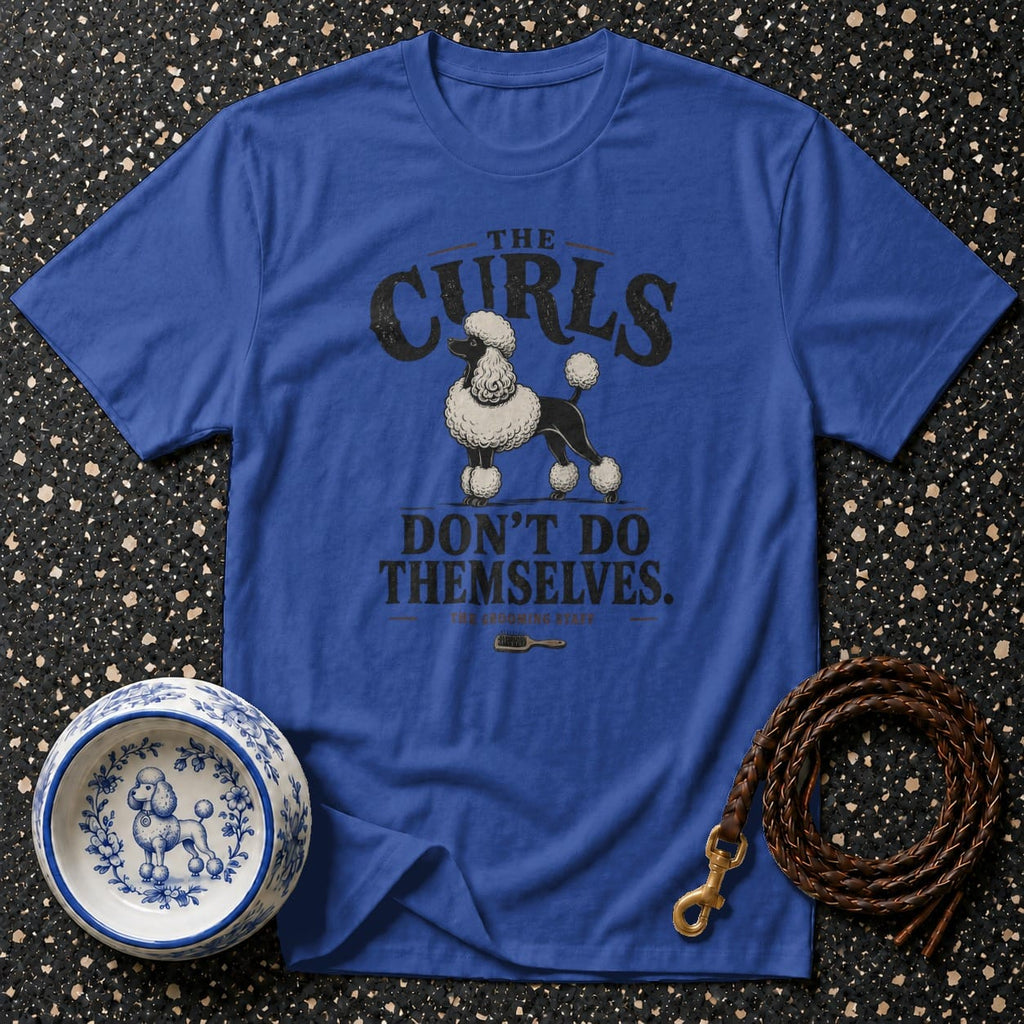 Blue t-shirt with a poodle graphic and text "THE CURLS DON'T DO THEMSELVES."