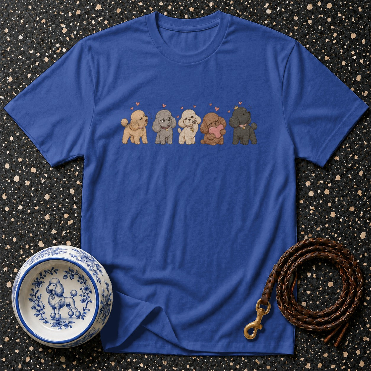 Blue t-shirt with cartoon poodles and pink hearts design.
